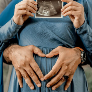 Woman holding ultrasound x-ray